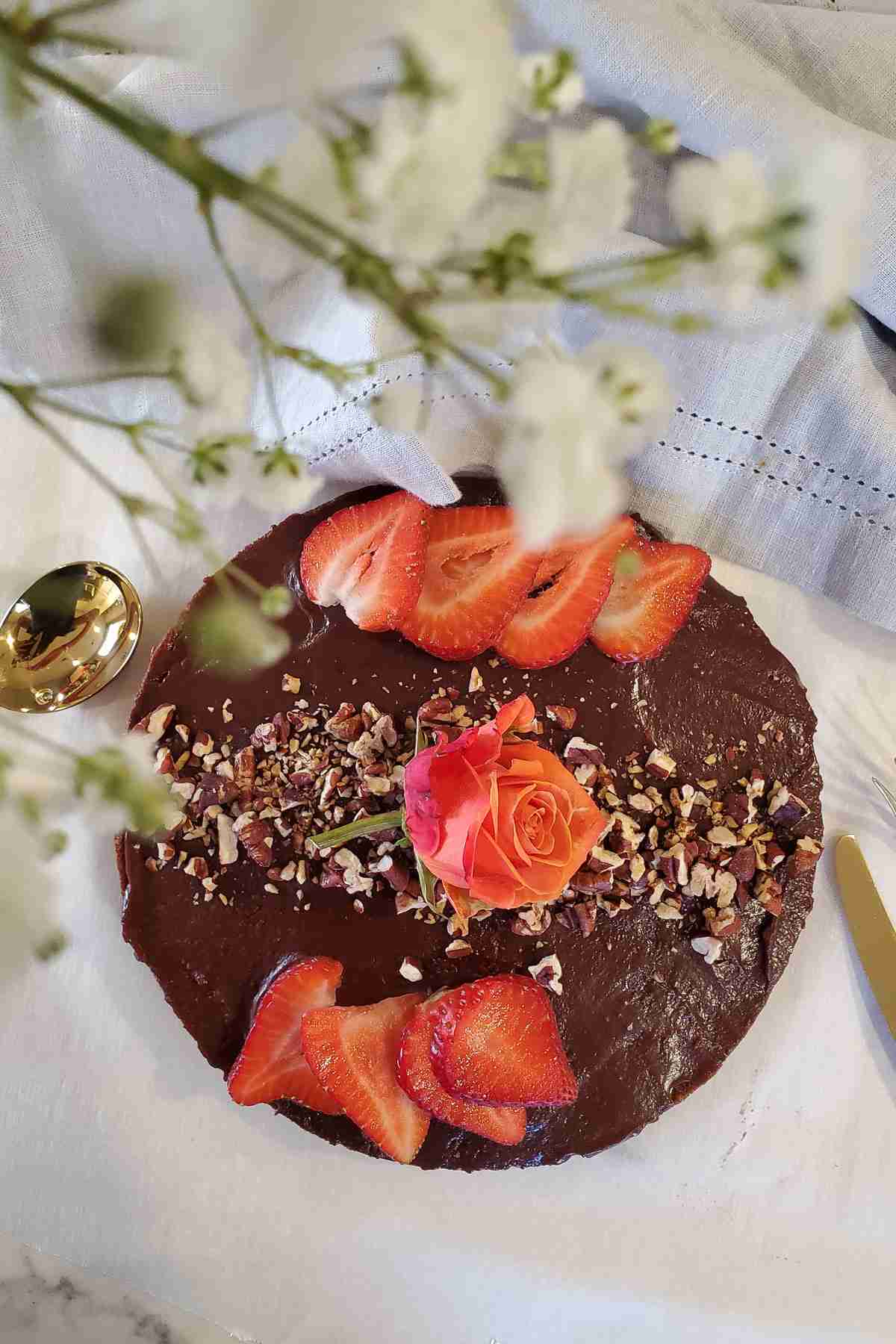 driskill-hotels-1886-chocolate-cake-round-strawberries-pecans-top-down